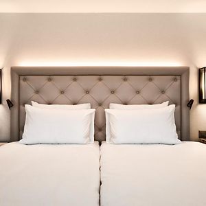 Deluxe Eck-Zimmer mit zwei Einzelbetten